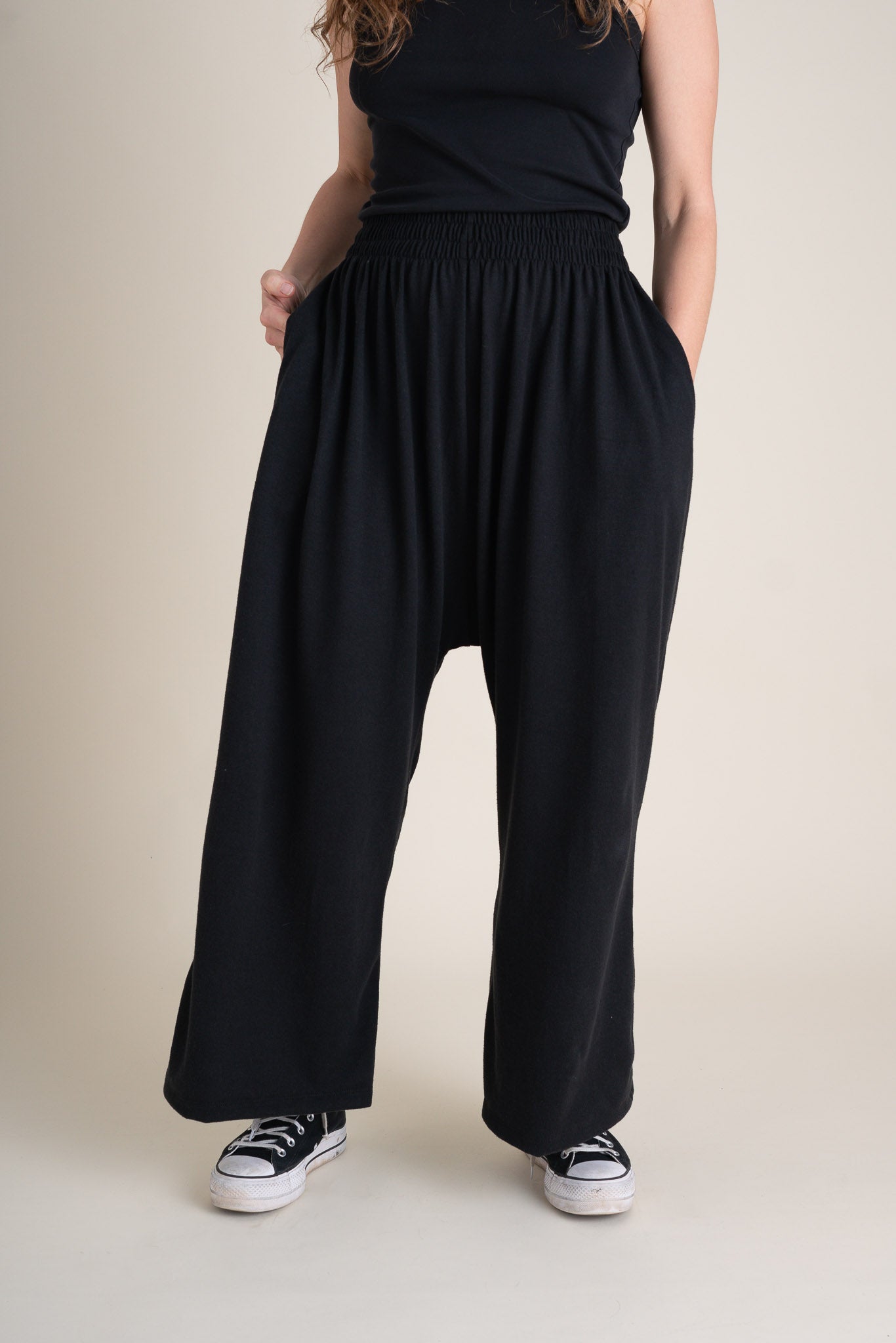 Audra is wearing a size L - Full Length.
