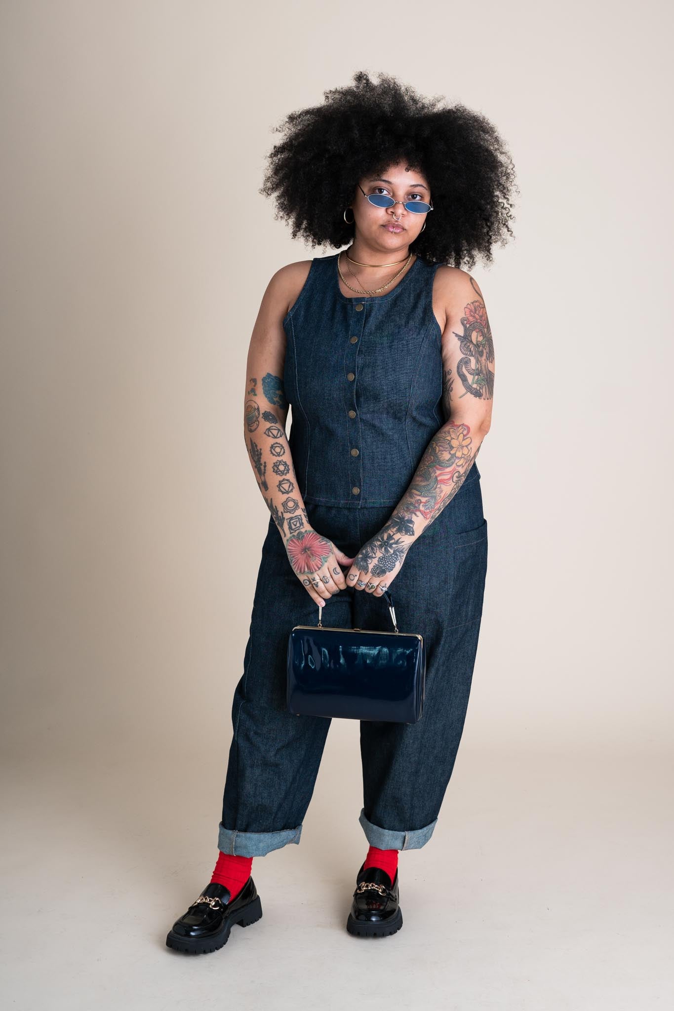 Ayanna is wearing a size XL 26"