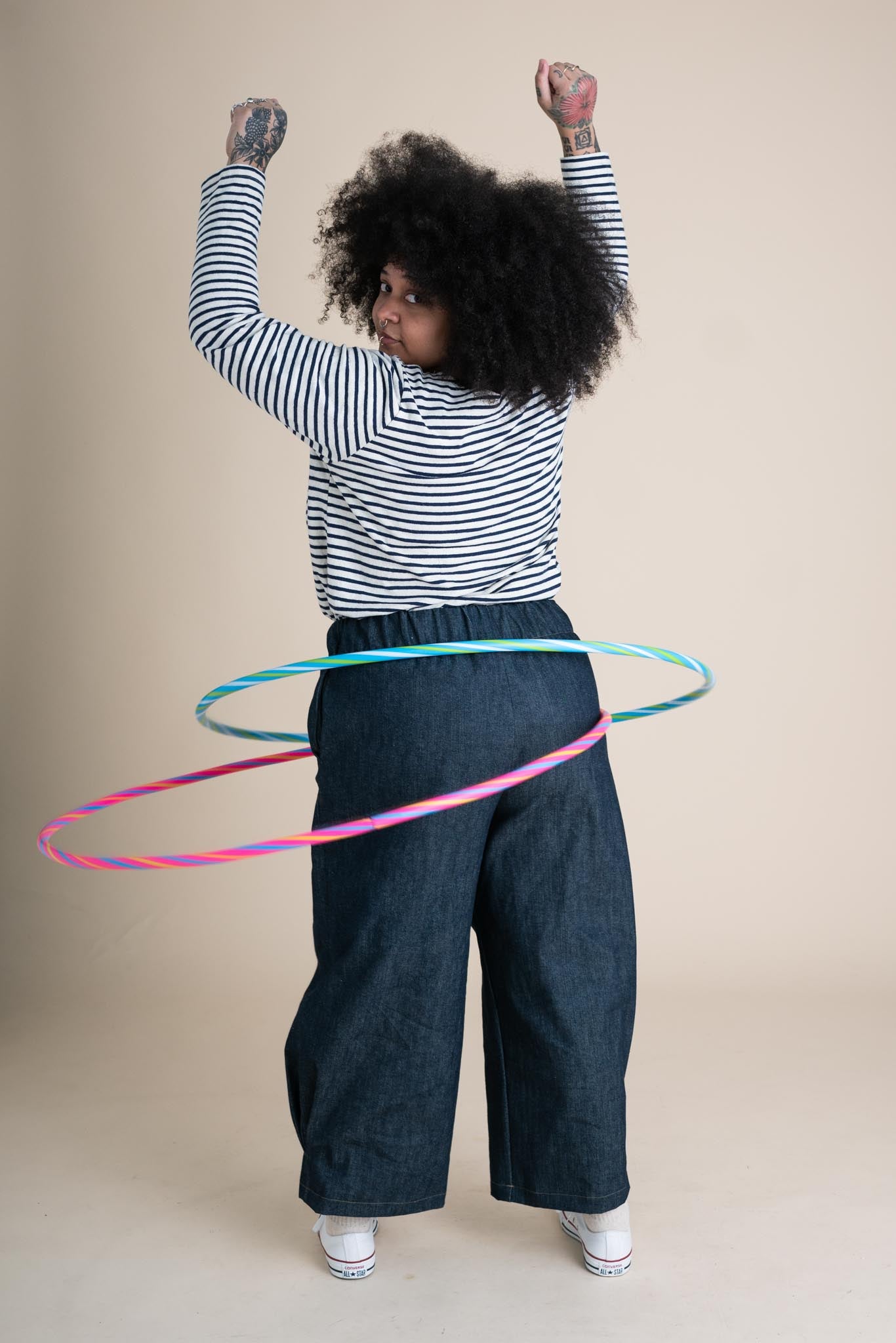 Ayanna is wearing a size XL 26"