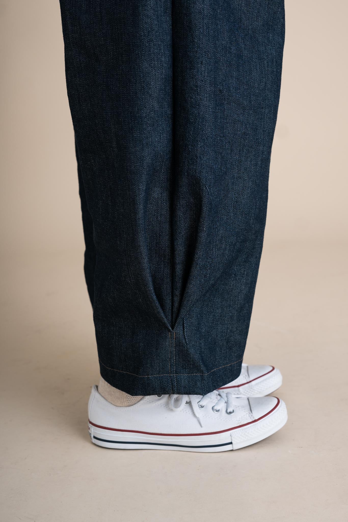 Ayanna is wearing a size XL 26"