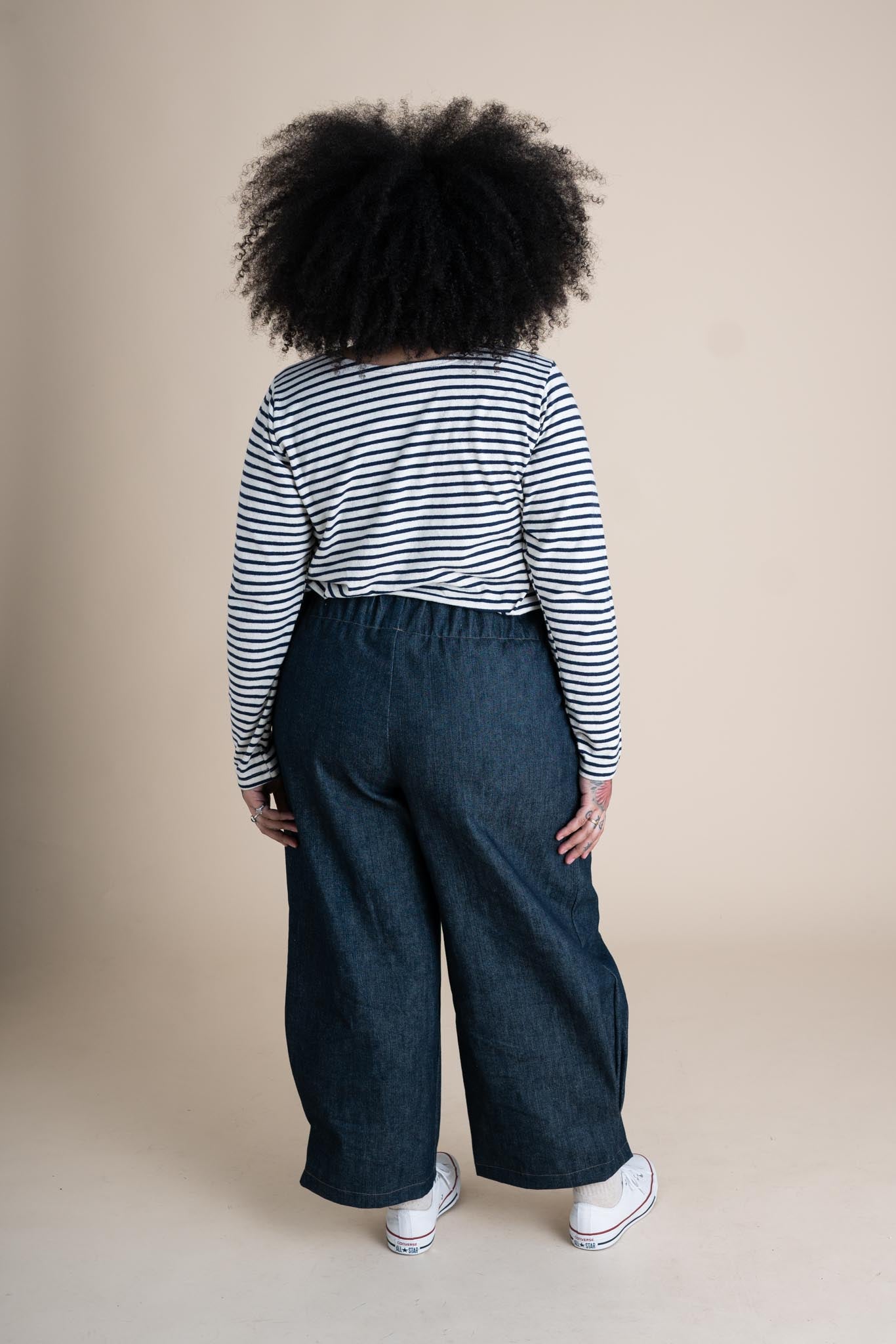 Ayanna is wearing a size XL 26"