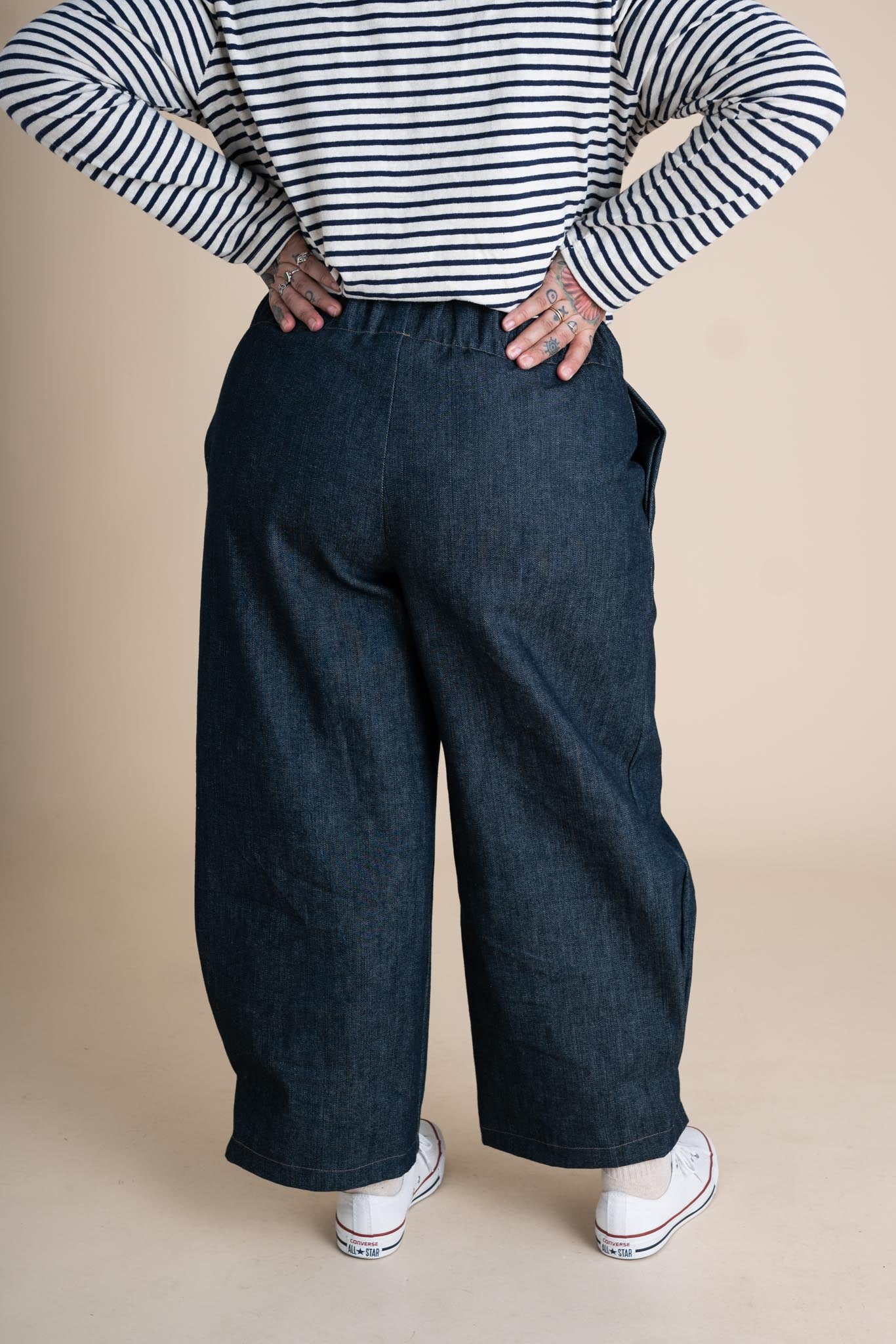 Ayanna is wearing a size XL 26"