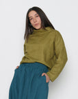 Eryn is wearing a M top and L skirt. Her measurements are: Height 5'6" | Bust 34.5" | Waist 29" | Hip 40"