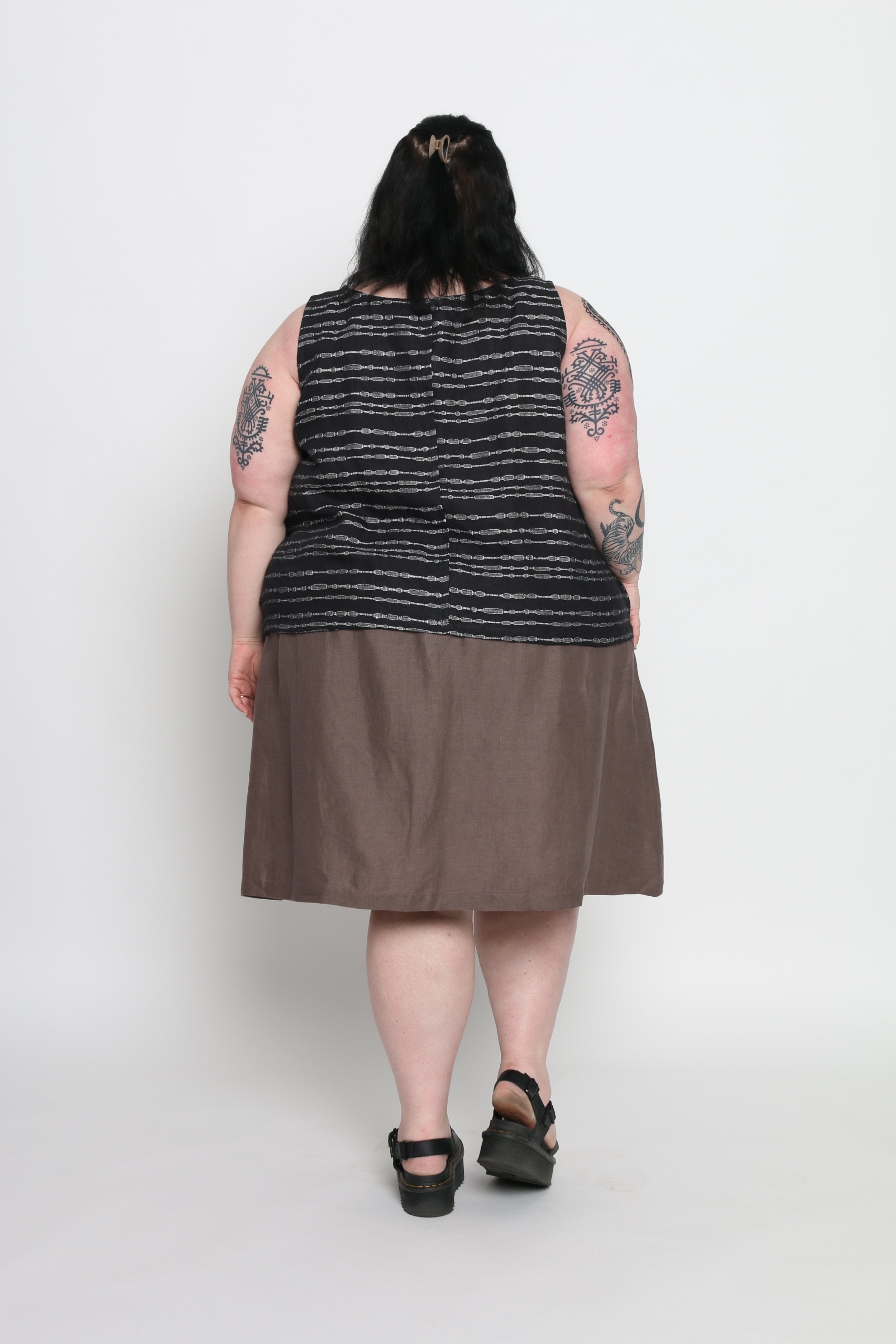 Jackie is wearing size 4X.