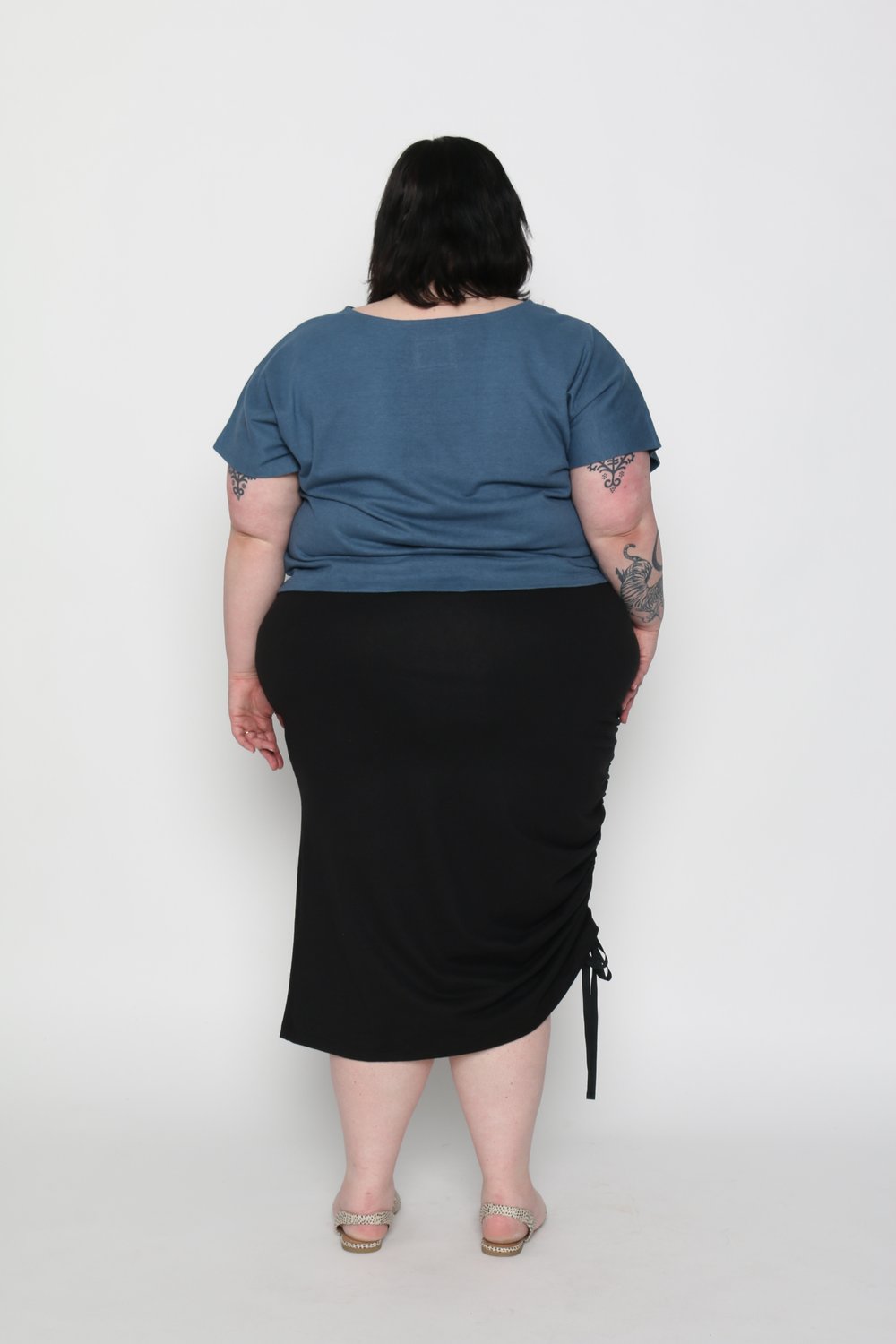 Jackie is wearing size 4X. Her measurements are: Height 5'8" | Bust 56" | Waist 53" | Hip 68.5"