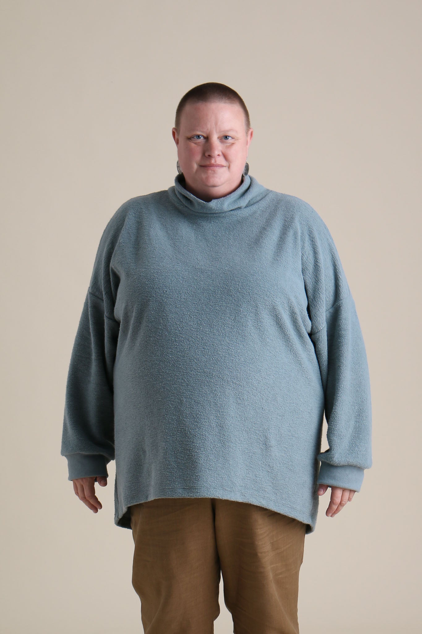 Katie is wearing a XXL.