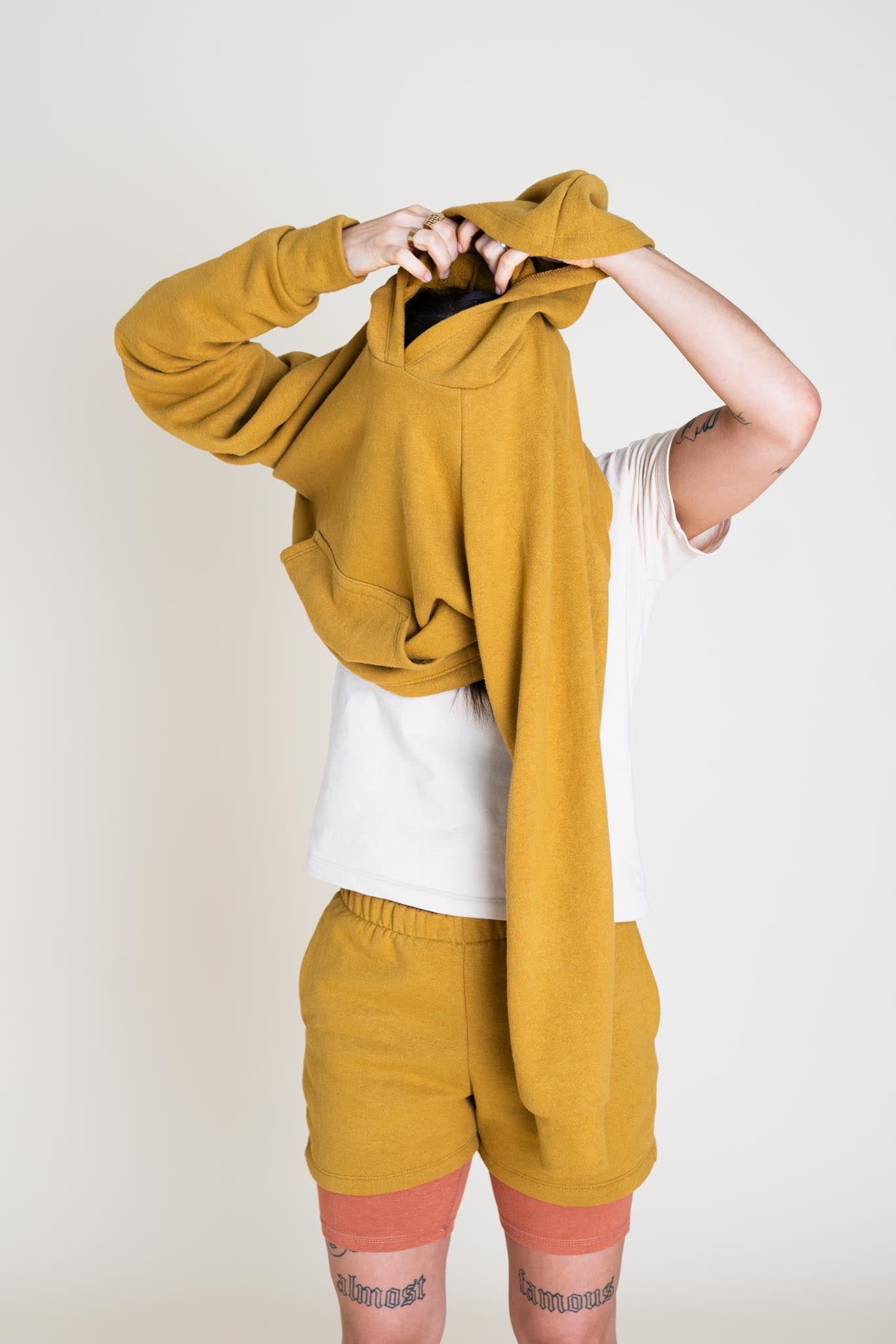 LJ is wearing a size XXS Cropped.