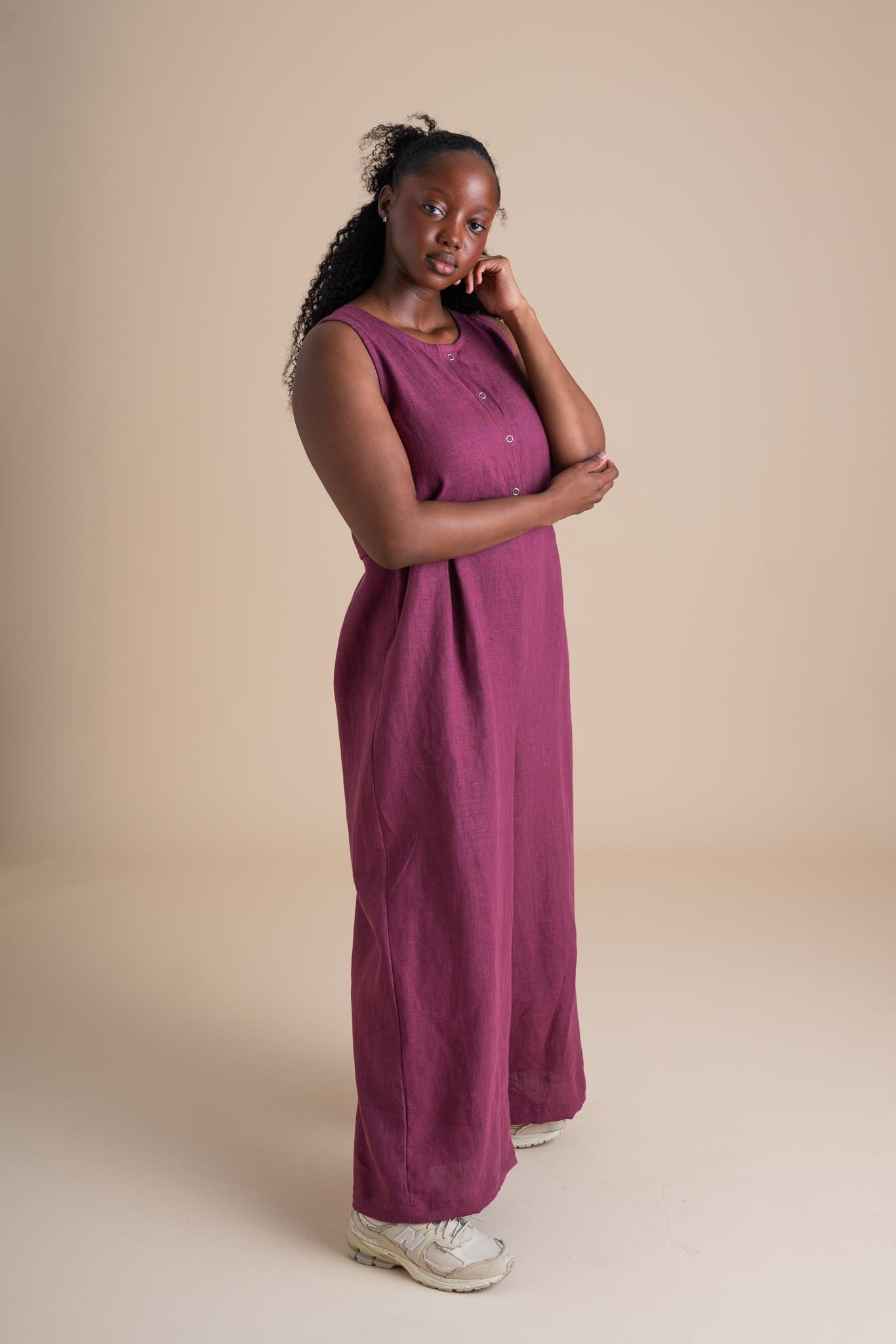 Ziya is wearing a size S, Short.