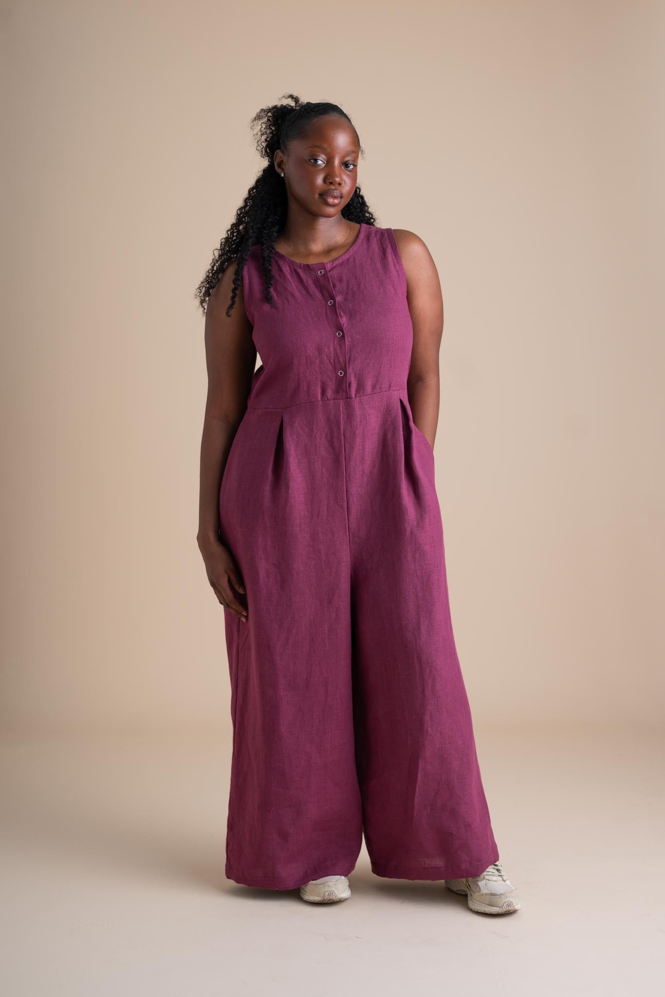 Ziya is wearing a size S, Short.