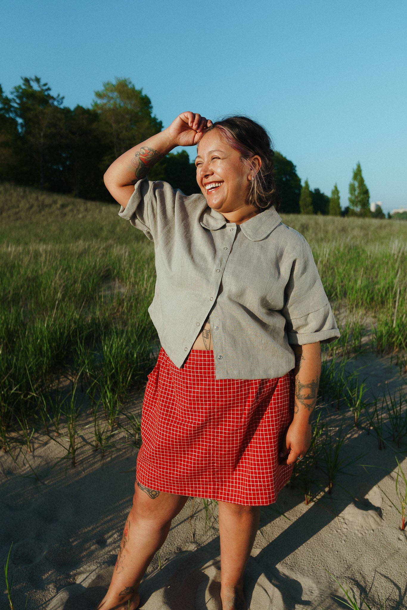 Esme is wearing a size XL top and XXL skirt.