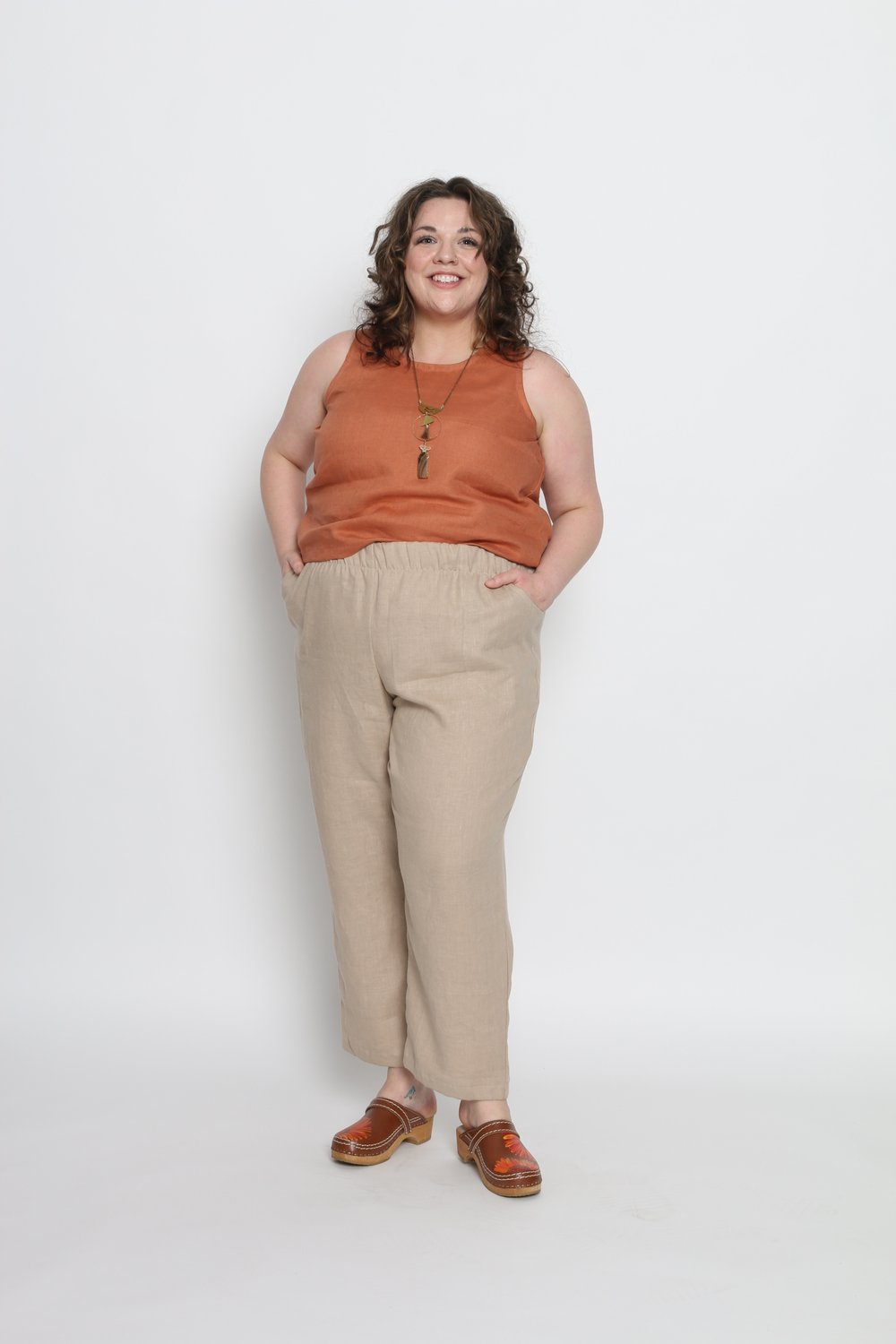 Amber is wearing an XL. Her measurements are: Height 5'7" | Bust 49" | Waist 47" | Hip 53"