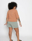 Ayanna is wearing a size XXL top and XL bottom. Her measurements are: Height 5'3" | Bust 49" | Waist 39" | Hip 50"