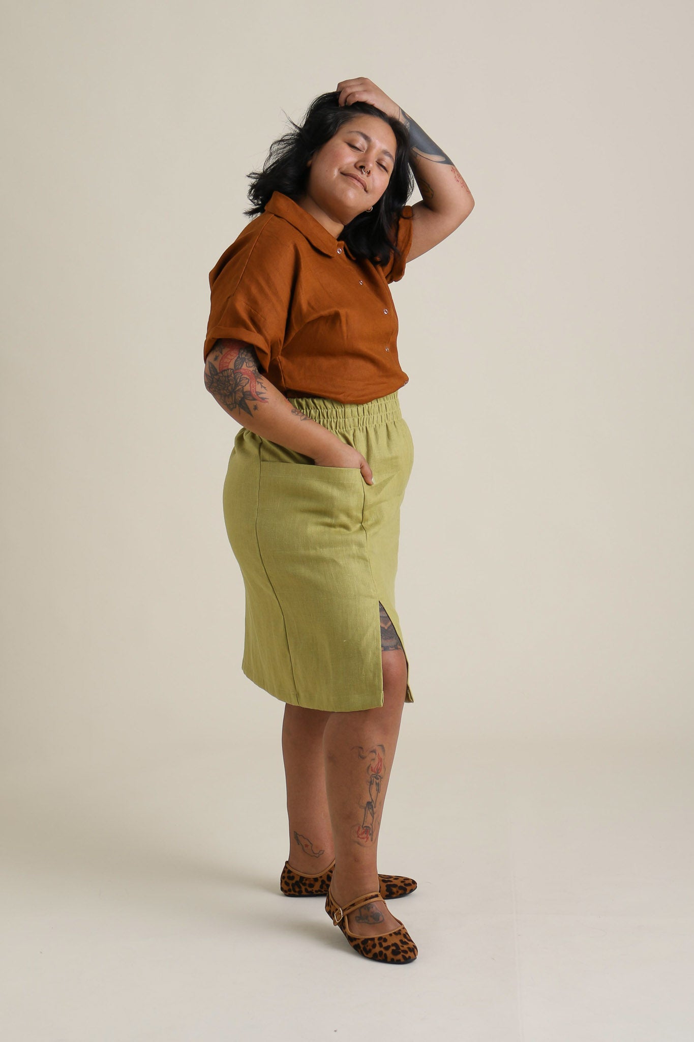 Esme is wearing a size XL.