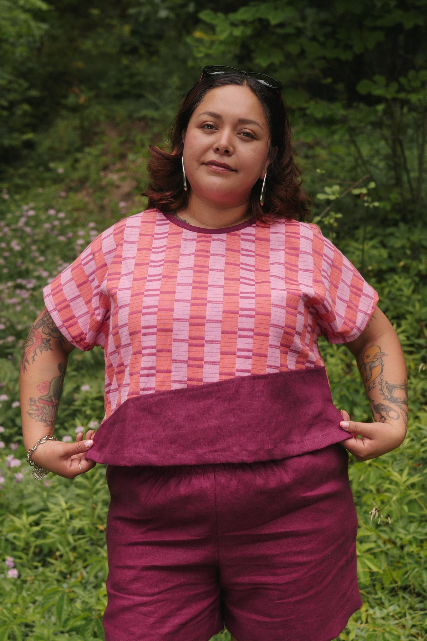 Esme is wearing a size XL.