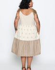 Esme is wearing a size L. Her measurements are: Height 5'3" | Bust 38" | Waist 36" | Hip 48"