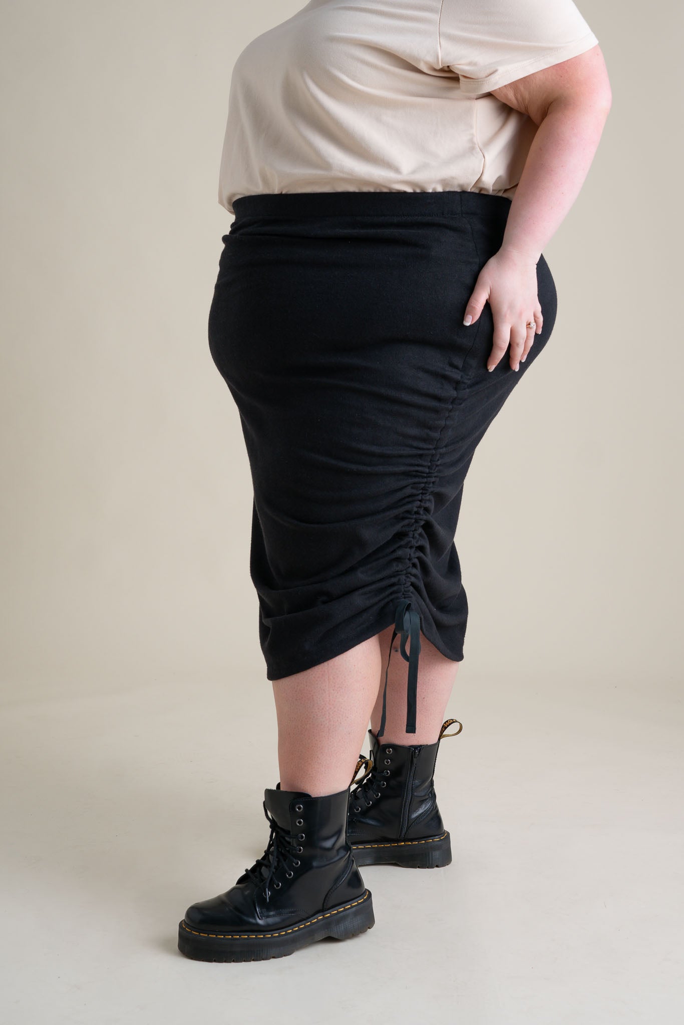 Jackie is wearing a size 4X.