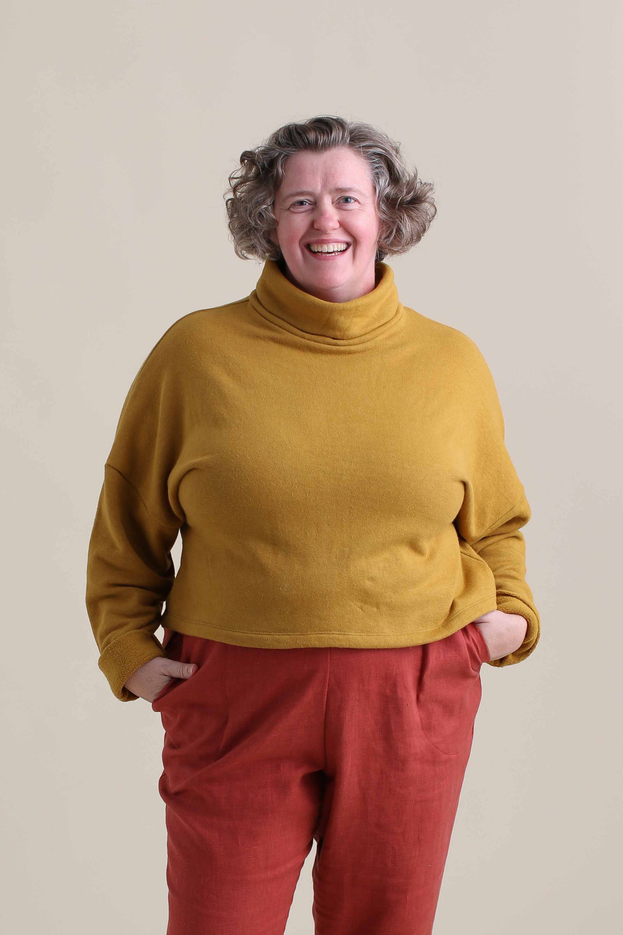 Liz is wearing a size XXL.
