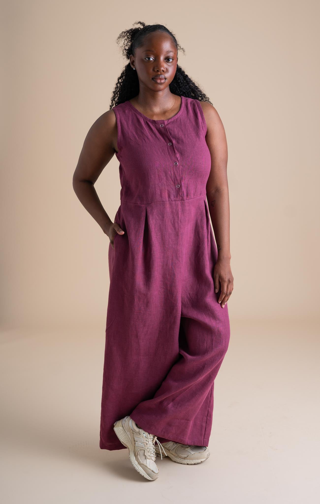 Ziya is wearing a size S, Short.