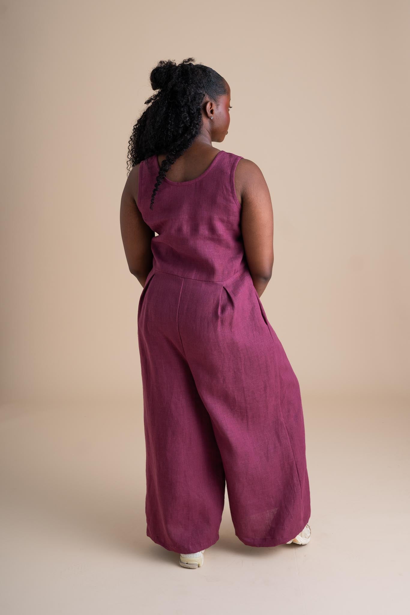 Ziya is wearing a size S, Short.